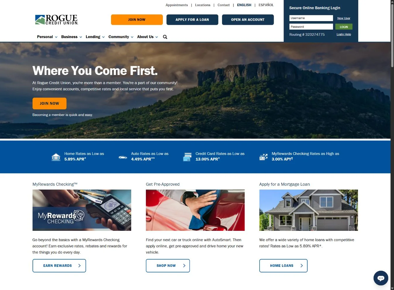 Rogue Credit Union homepage with member navigation, a mountain landscape hero, and cards for checking, auto loans, and home loans.